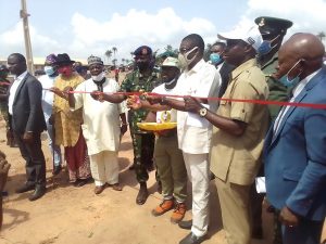 Edo State Deputy Governor Philip Shaibu in a group photograph with the corps members at the NYSC Permanent Orientation Camp, Okada