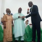 Chief Olorunfemi receiving the award from Okoronkwo_1606749026756