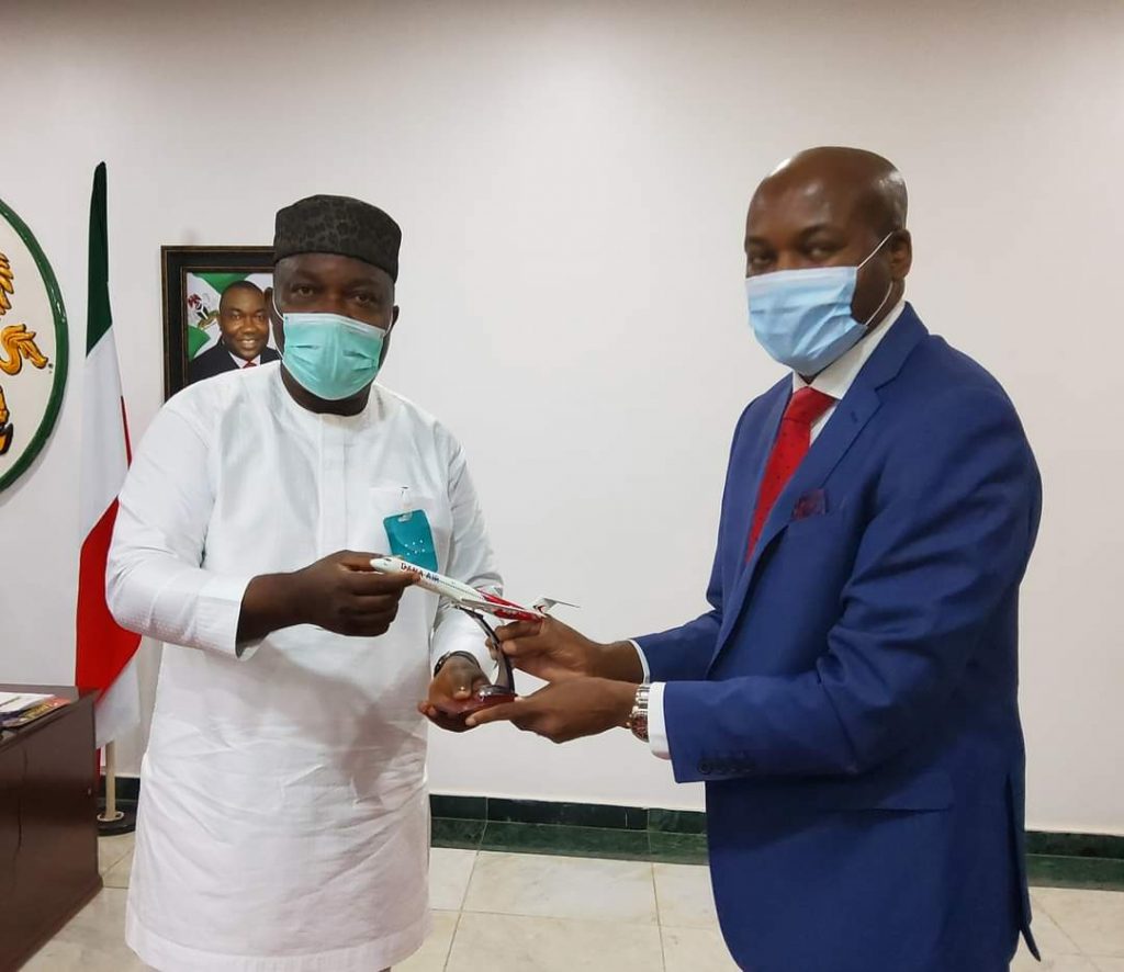 Enugu State Governor Ifeanyi Ugwuanyi (L), Dana Air CEO Obi Mbanuzuo (R)