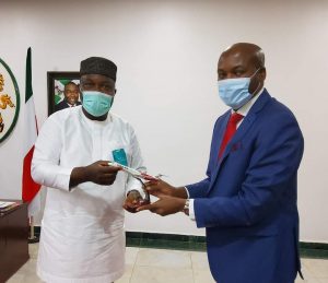 Enugu State Governor Ifeanyi Ugwuanyi (L), Dana Air CEO Obi Mbanuzuo (R)