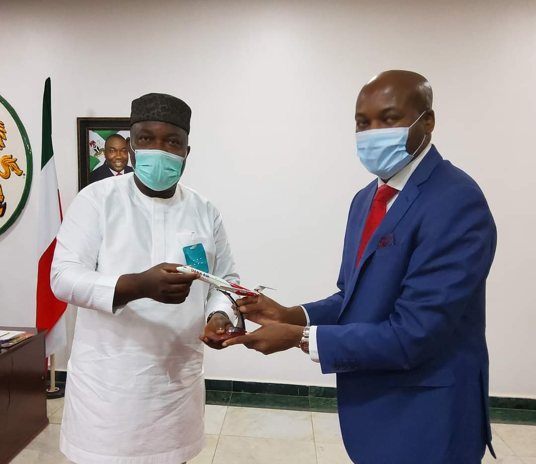 Enugu State Governor Ifeanyi Ugwuanyi (L), Dana Air CEO Obi Mbanuzuo (R)