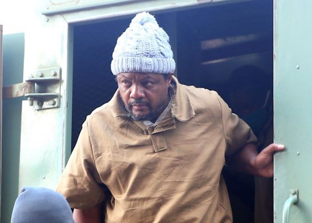 Zimbabwean journalist Hopewell Chin’ono, who was arrested last month for supporting anti-government protests, arrives at court in Harare