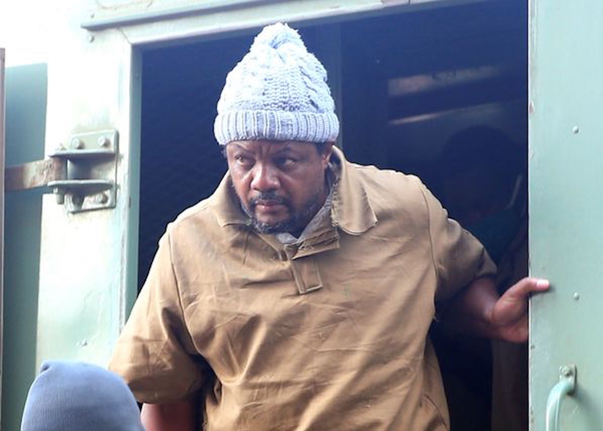 Zimbabwean journalist Hopewell Chin’ono, who was arrested last month for supporting anti-government protests, arrives at court in Harare