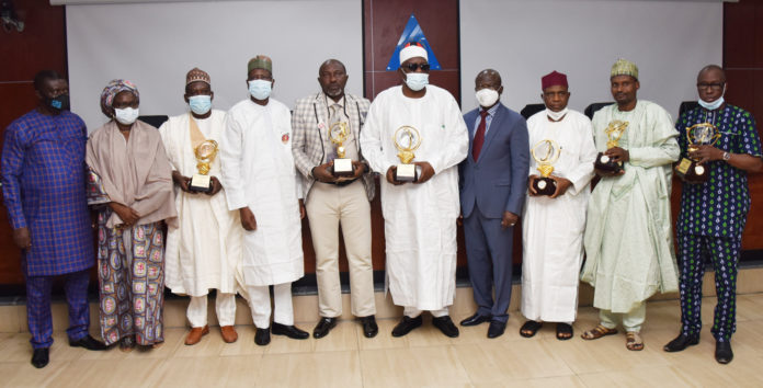 Permanent Secretary, Federal Ministry of Labour and mployment, Peter Tarfa, PhD, (4th Left); Director General, National Productivity Centre, Dr Kasheem Akor (4th right) with the Awardees of the Productivity and Innovations Award in Abuja