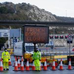 UK reaches deal with France to allow trucks to cross border from Wednesday