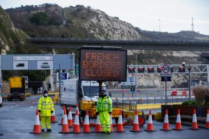 UK reaches deal with France to allow trucks to cross border from Wednesday