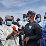 Sokoto Governor Aminu Tambuwal (L), PDP National Chairman Uche Secondus (R)