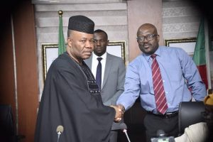 Minister of Niger Delta Affairs Godswill Akpabio (L), NDDC Interim Board Chairman Prof Kemebradikumo Pondei (R)