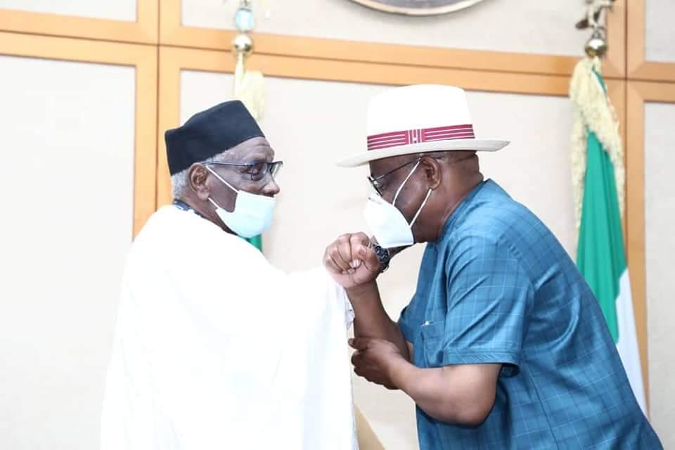 NEF Chairman Ango Abdullahi (L), Rivers State Governor Nyesom Wike (R)