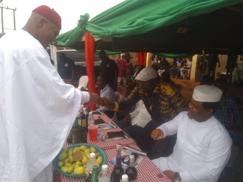 Enugu Commissioner for Lands Dr Victor Nnam (L)
