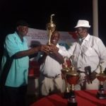 Tournament’s overall winner, Ben Okoko, receives his trophy from Angelo Elosia, the Chairman/Chief Coordinator of the Save The Lives Charity Golf Tournament, and IBM Haruna, the Chairman, Board of Trustees, IBB International Golf and Country Club In Abuja on Saturday