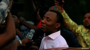 Former presidential candidate Omoyele Sowore talks to the media after being released on bail by Nigeria’s government, in Abuja