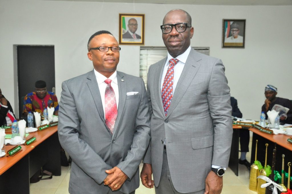 Patrick Okundia (L), Edo State Governor Godwin Obaseki (R)