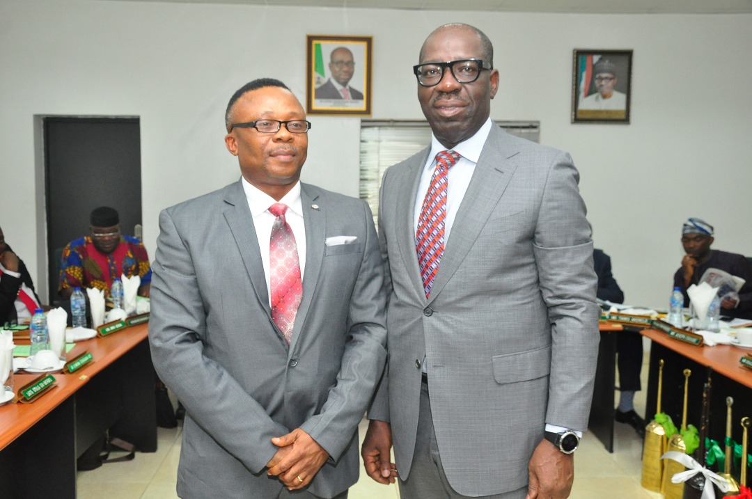 Patrick Okundia (L), Edo State Governor Godwin Obaseki (R)