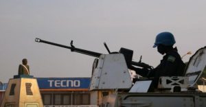 A peacekeeper from the United Nations Multidimensional Integrated Stabilisation Mission in the Central African Republic (MINUSCA) armoured personnel carrier (APC) keeps guard as they patrol the streets ahead of the upcoming elections in Bangui, the Central African Republic Dec. 26, 2020. (Reuters photo)