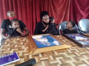 Mrs Akioyamen, widow and the children of late Mr Matthew Akioyamen, during a press briefing in Benin City on Thursday, January 14, 2021