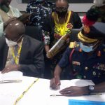 Director General NMDC Prof Linus Asuquoand Representative of the Commandant NDA signing Memorandum of Understanding on development solid Minerals in Nigeria