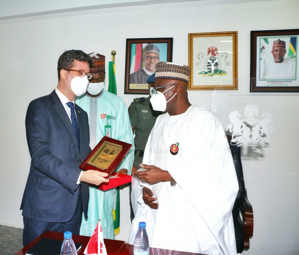 Canadian Acting High Commissioner to Nigeria Nicolas Simard (L), Minister of Police Affairs Alhaji Mohammad Dingyadi (R)