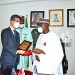Canadian Acting High Commissioner to Nigeria Nicolas Simard (L), Minister of Police Affairs Alhaji Mohammad Dingyadi (R)