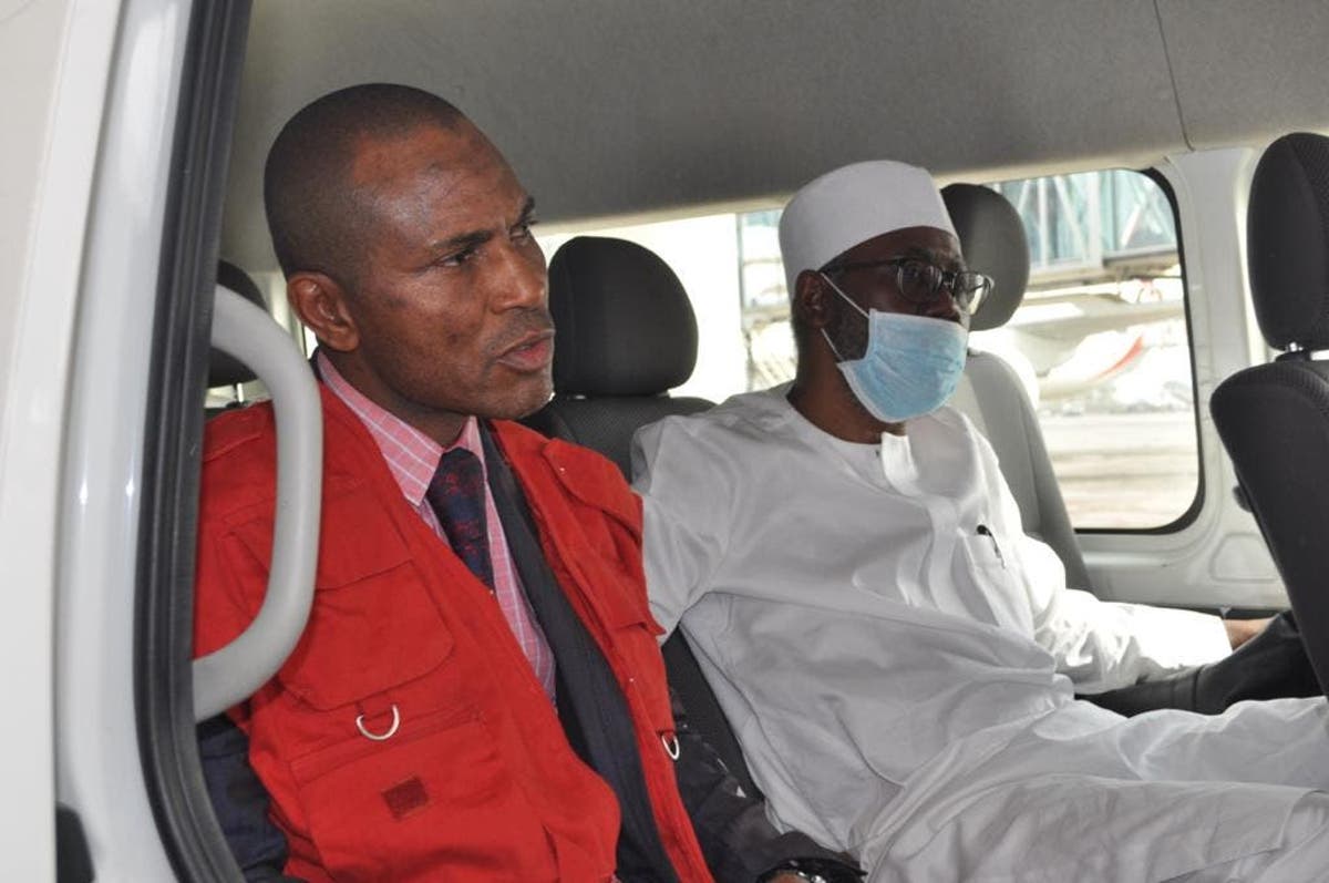 Ex-AGF/Minister of Justice Mohammed Adoke (R)