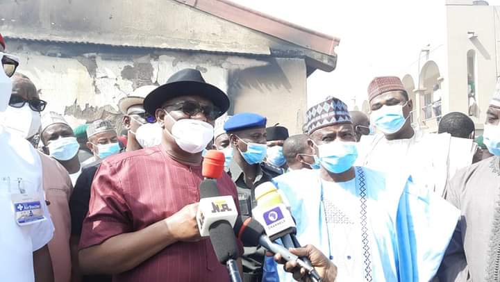 Rivers Governor Nyesom Wike (L), Sokoto Governor Aminu Tambuwal (R)