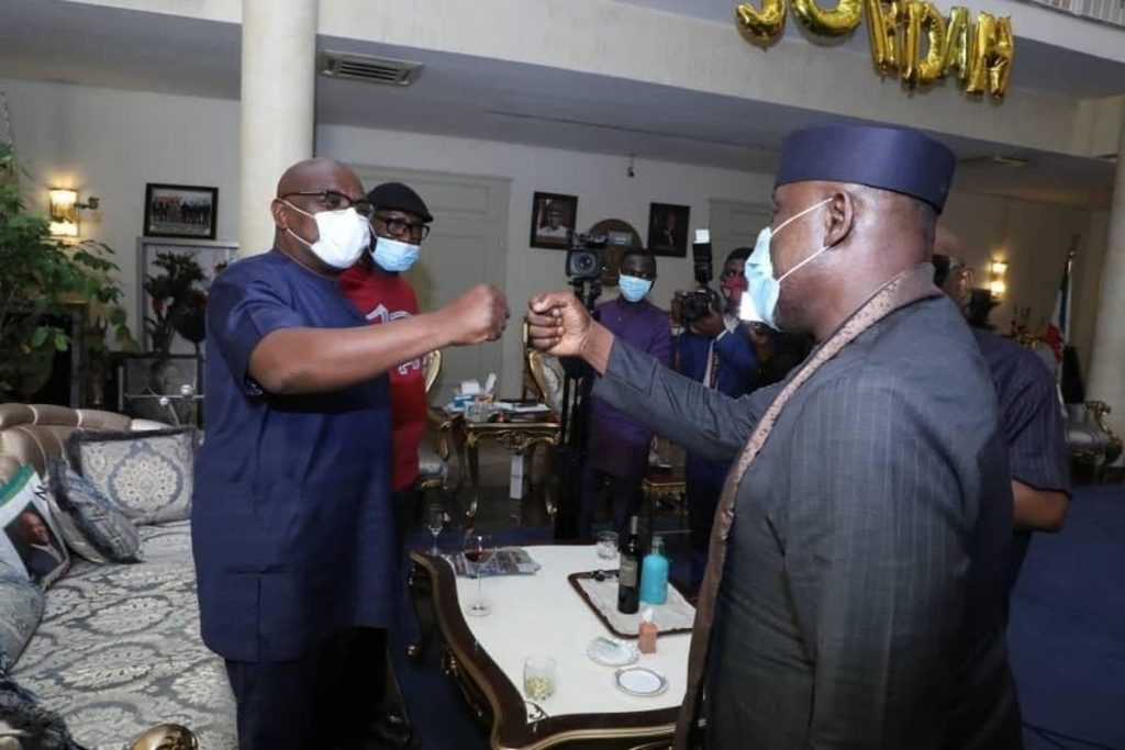 Rivers Governor Nyesom Wike (L), Senator Rochas Okorocha (R)