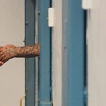 US states shut down prisons as guards contract COVID-19