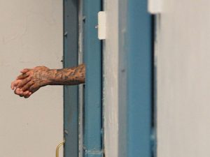US states shut down prisons as guards contract COVID-19
