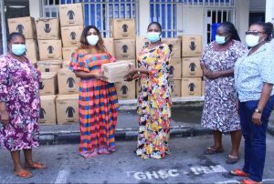 Dr Beta Edu ( 2nd left) handing over one of the items to Dr Janet Ekpenyong