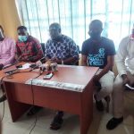 Executive Director of FGGSC Austin Osakue flanked by other members of the group during a press briefing in Benin City