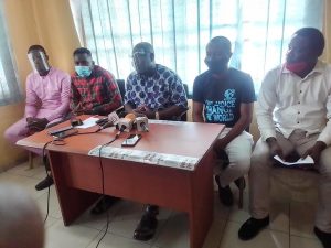 Executive Director of FGGSC Austin Osakue flanked by other members of the group during a press briefing in Benin City