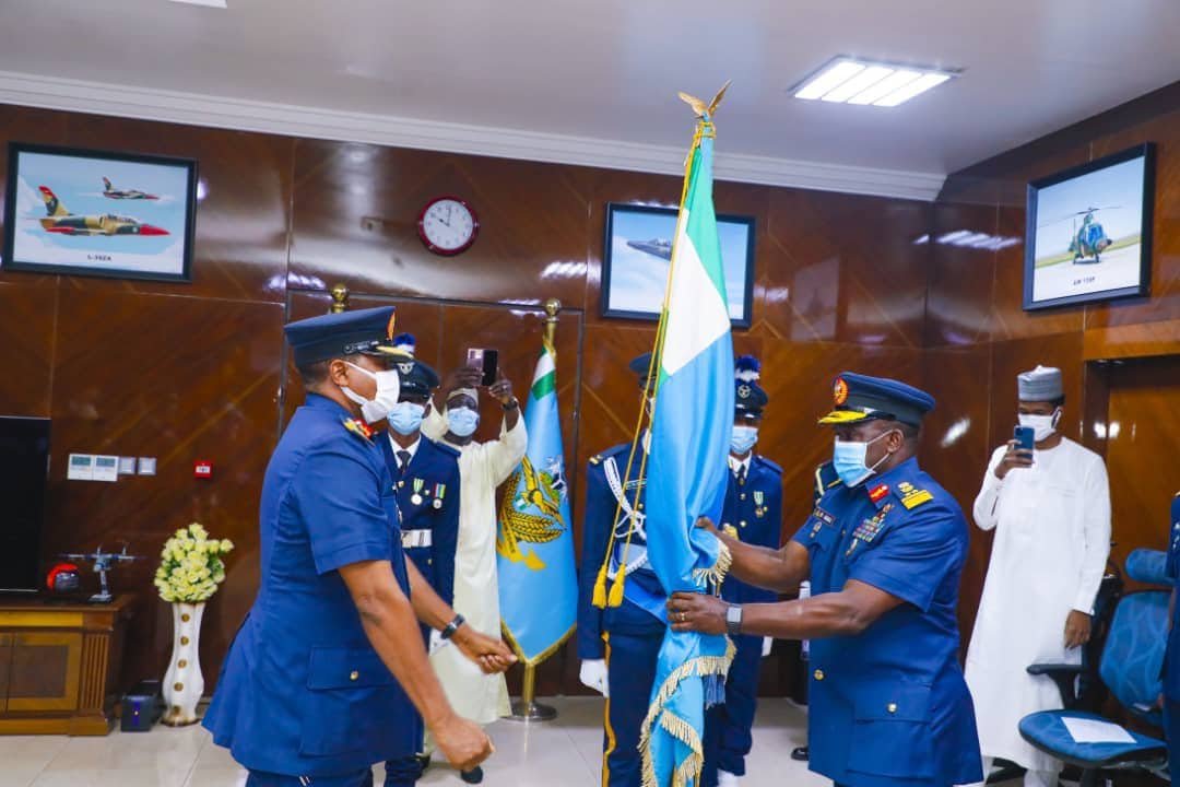 NAF AIr Marshall Abubakar Sadique handed the mantle of leadership to Air Vice Marshal Isiaka Oladayo Amao on Friday, January 29 2021