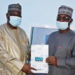 Managing Director, News Agency of Nigeria (NAN), Mr Buki Ponle (R) and Executive Secretary, National Health Insurance Scheme (NHIS), Prof. Mohammed Sambo, at NAN headquarters in Abuja.