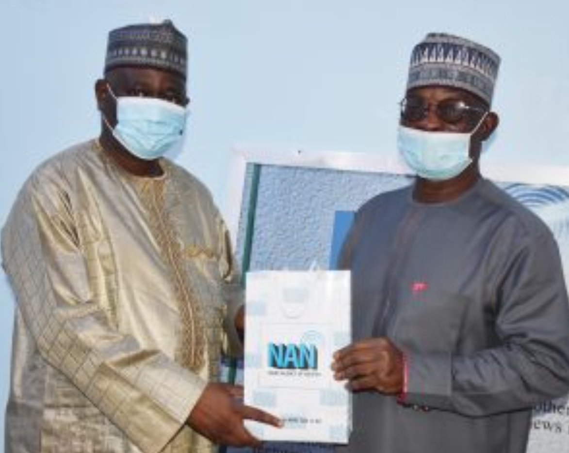 Managing Director, News Agency of Nigeria (NAN), Mr Buki Ponle (R) and Executive Secretary, National Health Insurance Scheme (NHIS), Prof. Mohammed Sambo, at NAN headquarters in Abuja.