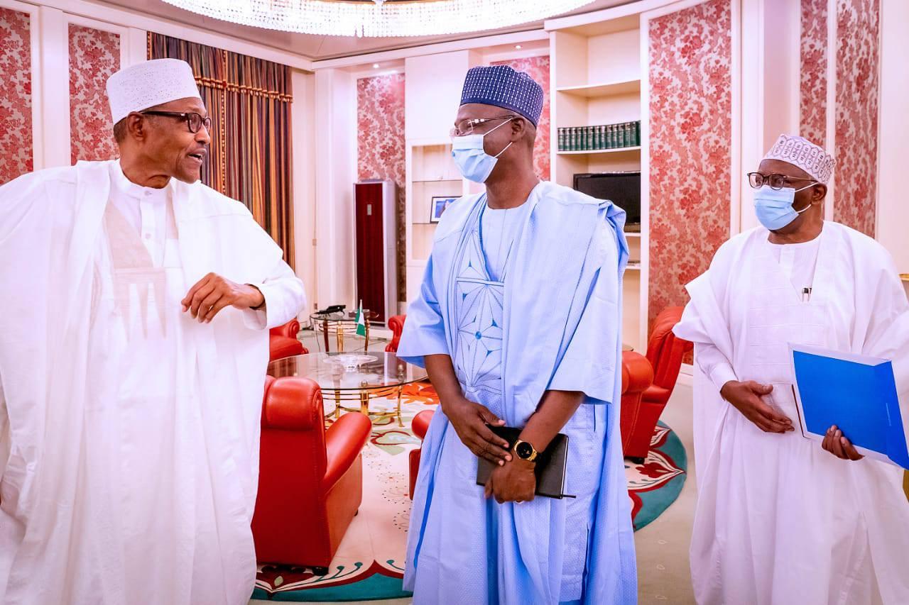 President Muhammadu Buhari (L), Nasarawa Governor Abdullahi Sule (C)