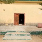 A door leave is seen laid aside a day after over 300 school girls were abducted by bandits away from the JSS school in Zamfara