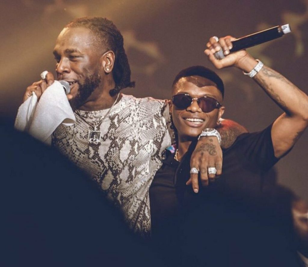 Burna Boy (L), Wizkid (R)