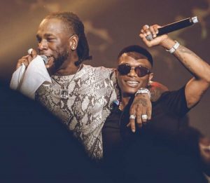 Burna Boy (L), Wizkid (R)