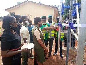 Chairperson of the VSF Taskforce, Mrs Toyosi Akerele-Ogunsiji, commissioning the borehole in Community Secondary School, Mbaukwu