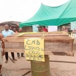 Abia community protests ‘crazy’ electricity bills, dump coffin at EEDC office