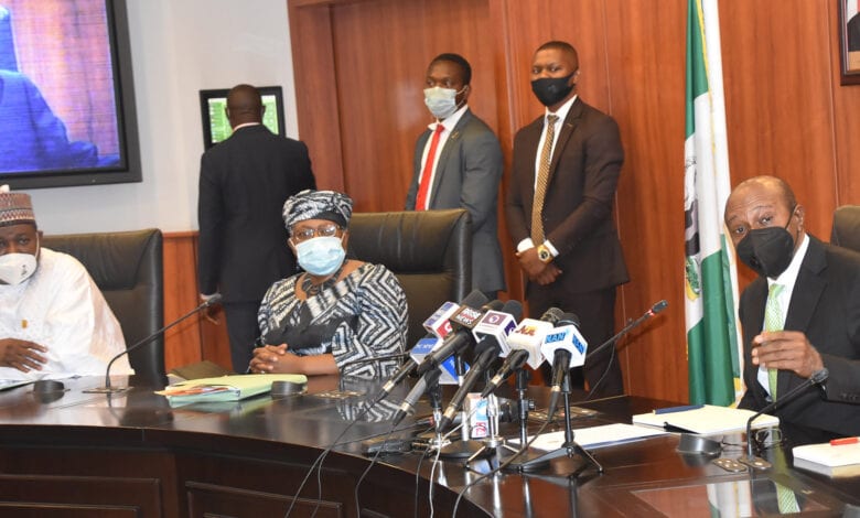 WTO DG Ngozi Okonjo-Iweala (centre), CBN Governor Godwin Emefiele (right)