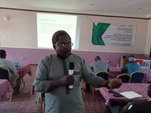 A facilitator addressing Plateau communities on farmer-herder conflicts