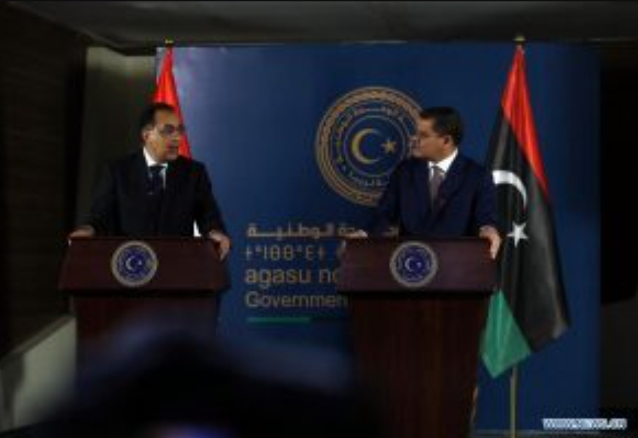 Libya’s Prime Minister Abdul Hamid Dbeibah (R) and Egyptian Prime Minister Mostafa Madbouly attend a press conference in Tripoli, Libya, on April 20, 2021. Libya’s Prime Minister Abdul Hamid Dbeibah on Tuesday met with visiting Egyptian counterpart Mostafa Madbouly to discuss boosting bilateral cooperation. (Photo by Hamza Turkia/Xinhua