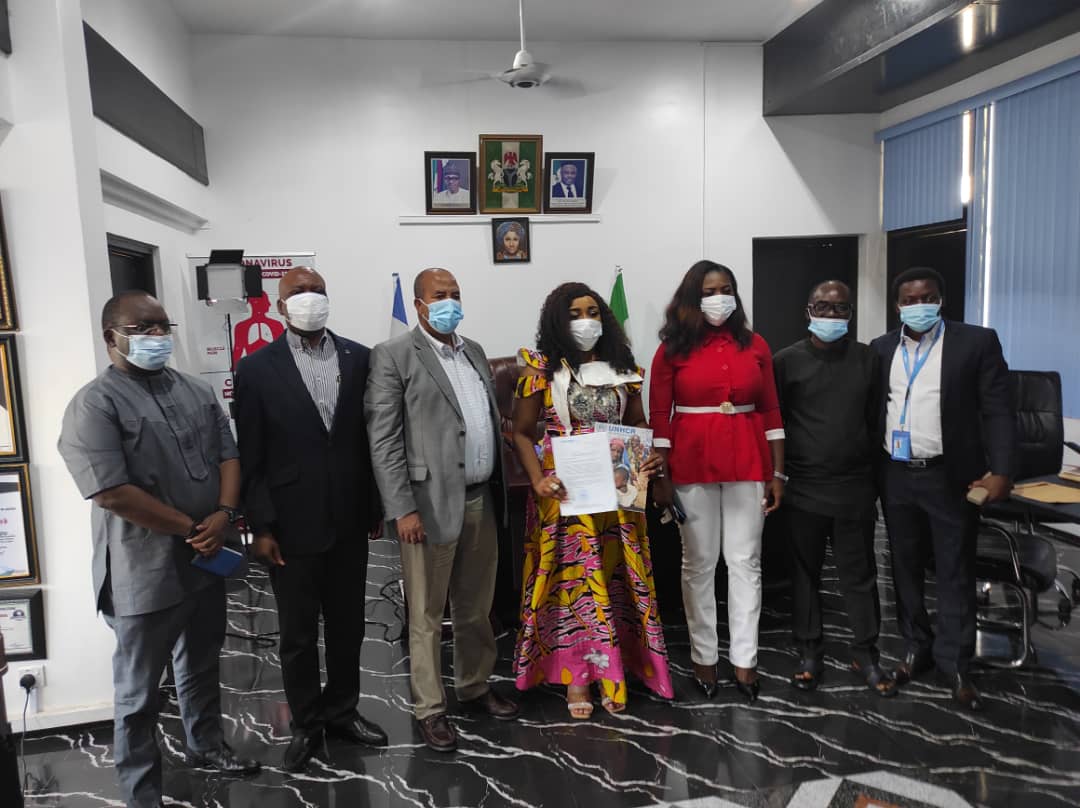 Dr Beta Edu, Health Commissioner (Centre) in a group picture with the delegation of UNHCR dueing the courtesy visit in Calabar