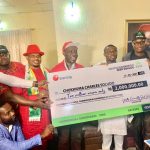 YESS members presenting N2m cheque to Prof. C. C. Soludo