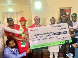 YESS members presenting N2m cheque to Prof. C. C. Soludo