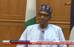 821a7036-buhari-696×448