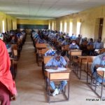 Students-writing-exam-in-Kishi-Community-Sch