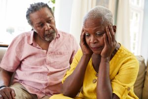 man-comforting-older-woman-with-depression
