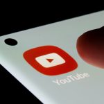 YouTube app is seen on a smartphone in this illustration